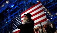 A Jewish man watches voting results come in at Democratic presidential nominee former Secretary of State Hillary Clinton's election night event at the Jacob K. Javits Convention Center November 8, 2016 in New York City. Win McNamee/Getty Images/AFP