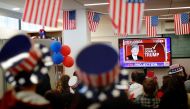 Israelis follow the US presidential elections on TV at the American Center in Jerusalem on November 9, 2016. AFP / THOMAS COEX