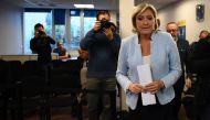 
President of the French far-right party and presidential candidate for the 2017 French Presidential elections Marine Le Pen leaves after delivering a speech during a press conference on november 9, 2016 in the party headquarters inNanterre, near Paris, 