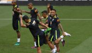 Brazil's national team player Neymar (R) participates in a training session at Mineirao stadium in Belo Horizonte, Minas Gerais, Brazil, on November 9, 2016 ahead of their WC 2018 qualifier against Argentina next November 10. / AFP / VANDERLEI ALMEIDA

