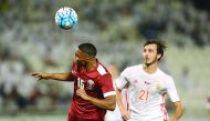 Qatar's Pedro Miguel (left) heads the ball while Russia's Aleksandr Kokorin looks on during their international friendly match played at Al Sadd SC Stadium