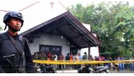 Toddlers were playing in the parking area of the church, on Borneo island, when a man threw bombs from his motorbike. (Photo: AFP)