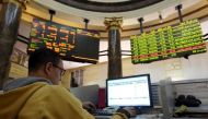 A trader works at the Egyptian stock exchange in Cairo, Egypt, December 3, 2015. REUTERS/Mohamed Abd El Ghany - RTX1X09Q