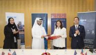 Abdulaziz bin Nasser Al Khalifa (second left), Chairman of QBIC and CEO of QDB and Mayor of Paris, Anne Hidalgo (third left) and Eric Chevallier, French Ambassador to Qatar (right) at the signing ceremony  yesterday.