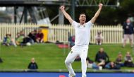 South Africa's paceman Kyle Abbott celebrates the team's victory at the end of the second Test cricket match between Australia and South Africa in Hobart on November 15, 2016. AFP / SAEED KHAN 