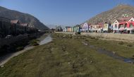 In this photograph taken on November 10, 2016 a general view of the Kabul river is seen in the Kabul. After two winters without snow, Kabul residents are anxiously scouring the hills for the first flakes, wary that the depletion of this major source of wa