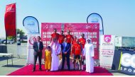 The winners of the second round of the Royal Air Maroc Cycling League pose with the officials of QCF, QCR and QC.