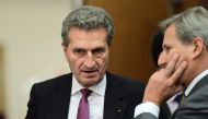 EU Commissioner for the Digital Economy and Society Guenther Oettinger (L) attends the weekly college meeting of the EU commission at European Commission in Brussels, on November 16, 2016. (AFP / EMMANUEL DUNAND) 