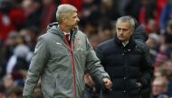 Arsenal manager Arsene Wenger and Manchester United manager Jose Mourinho at the end of the match. (Reuters / Jason Cairnduff)