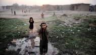 Afghani children are seen during the World Children's day, at the Afghani Refugee camp in Islamabad, Pakistan on November 20, 2016. ( Metin Aktas - Anadolu Agency )
