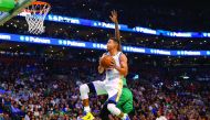 Golden State Warriors guard Stephen Curry (30) drives to the basket against the Boston Celtics during their NBA game at TD Garden, in Boston, Massachusetts, US, on Saturday.