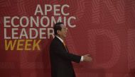 Taiwan's representative James Soong reaches out to shake hands with Peru's President Pedro Pablo Kuczynski (not pictured) as he arrives at the Lima Convention Centre for the APEC Leaders' Retreat on the last day of the Asia-Pacific Economic Cooperation (A