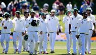 The Pakistan and New Zealand (back) teams walk from the field at the end of the first cricket Test match between New Zealand and Pakistan at Hagley Park in Christchurch on November 20, 2016. AFP / Marty MELVILLE
