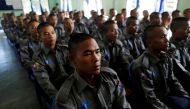 Ethnic Rakhine men attend a police training course as a civilian force will be deployed in the north of the Rakhine state in Sittwe, Myanmar, November 15, 2016. REUTERS/Soe Zeya Tun