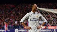 Real Madrid's Portuguese forward Cristiano Ronaldo celebrates after scoring his third goal during the Spanish league football match Club Atletico de Madrid vs Real Madrid CF at the Vicente Calderon stadium in Madrid, on November 19, 2016. / AFP / GERARD J