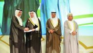 Masraf Al Rayan official receiving the appreciation award at the event. 