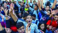 Tunisian students take part in a protest against new exam system at the Habib Bourguiba street in Tunis, Tunisia, yesterday. 