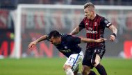 AC Milan's Juraj Kucka in action with Inter Milan's Gary Medel. REUTERS/Alessandro Garofalo
