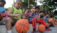 Young Indian children take part in a basketball summer training camp in Hyderabad (AFP Photo/Noah Seelam)
