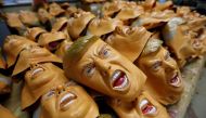 Rubber masks depicting U.S. President-elect Donald Trump are seen at the Ogawa Studios, a mask making company, in Saitama, Japan, November 21, 2016. REUTERS/Toru Hanai