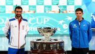 Croatia's tennis team player Marin Cilic (L) and Argentina's tennis team player Federico Delbonis pose for a picture after the official draw for their Davis Cup finals in Zagreb, Croatia November 24, 2016. REUTERS/Antonio Bronic
