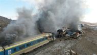 A handout picture released on November 25, 2016 by the Tasnim news agency shows damaged trains following an accident in the Semnan province, some 250 kms east of the Iranian capital Tehran. At least 40 people were killed in Iran early when an intercity ex