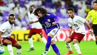 Al Ain's Omar Abdulrahman (centre) in action against Qatar’s El Jaish at the AFC Champions League Group D match in this file photo of  February 25, 2016.
