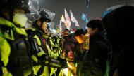 People attend a protest calling for Park Geun-hye to step down on a road leading to the Presidential Blue House in Central Seoul, South Korea, November 26, 2016. REUTERS/Kim Hong-Ji
