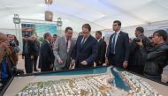 Tunisian Prime Minister Youssef Chahed (C) inspects a model during inauguration ceremony of Tunis Financial Port project in El-Hsayen region of Governorate of Ariana, Tunisia on November 27, 2016.