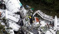 Rescue crew work in the wreckage from a plane that crashed into Colombian jungle with Brazilian soccer team Chapecoense near Medellin, Colombia, November 29, 2016. REUTERS/Fredy Builes
