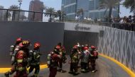 File photo of firefighters at the Larcomar Mall in Peru. Reuters 