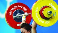 Turkey’s Sibel Ozkan in action during the Women’s 48kg Clean and Jerk competition during the 2008 Beijing Olympic Games in Beijing, China in this August 09, 2008 file photo. Ozkan has lost an appeal against a doping sanction which cost her a silver medal 