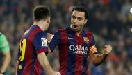 File photo of Lionel Messi (L) with teammate Xavi Hernandez during a match in Barcelona. Reuters 