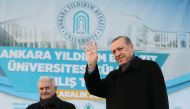 Turkish President Recep Tayyip Erdogan (R) and Turkish Prime Minister Binali Yildirim (L) attend opening ceremony of the Yildirim Beyazit University's Esenboga Main Campus in Ankara, Turkey on December 02, 2016. ( Kayhan Özer - Anadolu Agency )