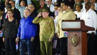 Cuban President Raul Castro salutes next to Venezuelan President Nicolas Mduro (R) and Brazilian former Presidents Dilma Rousseff (L) and Luiz Inacio Lula Da Silva, during the last ceremony to pay homage to the late Cuban leader Fidel Castro in Santiago, 