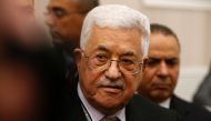 Palestinian president Mahmud Abbas (C) arrives to cast his vote at the Muqataa, the Palestinian Authority headquarters, in the city of Ramallah in the Israeli occupied West Bank, on December 3, 2016. Abbas's Fatah party held a vote for members of its ruli