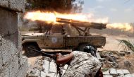 Libyan forces allied with the U.N.-backed government fire weapons during a battle with IS fighters in Sirte, Libya, July 21, 2016. REUTERS/Goran Tomasevic