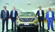 Faisal Sharif, Managing Director, (second right) Andrew Parrott (second left), Head of Sales and Marketing; and other officials during the launch of the new GS4 at  GAC Motor showroom yesterday.  Pic: Baher Amin/The Peninsula
