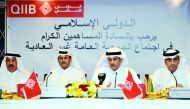 Sheikh Dr Khalid bin Thani bin Abdullah Al Thani, (third left) Chairman and Managing Director of QIIB, with Sheikh Abdullah bin Thani Al Thani (second left) Vice-Chairman of QIIB, and other Board Members during the Extraordinary General Assembly meeting i