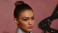 Model Gigi Hadid poses for photographers at the Fashion Awards 2016 in London, Britain December 5, 2016. REUTERS/Neil Hall
