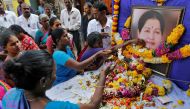 Supporters of Tamil Nadu Chief Minister Jayalalithaa Jayaraman attend a prayer ceremony at the AIADMK party office in Mumbai, India, December 6, 2016. (REUTERS/Danish Siddiqui)