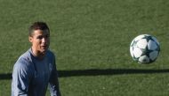 Real Madrid's Portuguese forward Cristiano Ronaldo attends a training session on the eve of the UEFA Champions league football match Real Madrid vs Borussia Dortmund at the Real Madrid's training ground of Valdebebas in Madrid on December 6, 2016. / AFP /