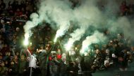 Players of Besiktas JK support their team during the UEFA Champions League football match between FC Dynamo Kiev and Besiktas JK at the Olympiyski Stadium in Kiev, Ukraine on December 6, 2016. ( Bülent Doruk - Anadolu Agency )
