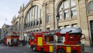Fire trucs are parked outside Gare du Nord as the Paris rail link was suspended from and to Gare du Nord, after an accident with a catenary that brought down power lines, on December 7, 2016.
Paris was smothered by its worst winter pollution in a decade,