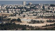 The picture shows a general view of construction cranes and excavators at the site of new housing units in the illegal Israeli settlement of Gilo in East Jerusalem al-Quds. (Photo: AFP)