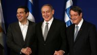 Israeli Prime Minister Benjamin Netanyahu (C) hosts Greek Prime Minister Alexis Tsipras (L) and Cypriot President Nicos Anastasiades during a trilateral meeting in Jerusalem to discuss eastern Mediterranean oil and gas on December 8, 2016. AFP / GALI TIBB