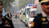 Coffins containing the remains of victims of the Pakistan International Airlines (PIA) plane crash arrive at PIMS hospital by ambulance in Islamabad, Pakistan December 8, 2016. REUTERS/Caren Firouz