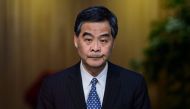 Hong Kong Chief Executive Leung Chun-ying reacts during a press conference in Hong Kong on December 9, 2016. Hong Kong's unpopular leader Leung said that he would not run again for office and would step down at the end of his term in July, citing family r
