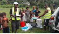 Solomon Islands Red Cross Auki Branch officers distribute aid to families affected by Saturday's earthquake, at Malaita province on the Solomon Islands in a handout photo December 9, 2016. Solomon Islands Red Cross/Handout via REUTERS
