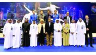 Youngjun Kweon of Korea, winner of the Qatar Grand Prix poses for a group picture with officials of Qatar Fencing Federation at Aspire Zone yesterday. Kweon defeated Bardenet Alexandreof France 15-13 in the final. In the semi-final, Kweon defeated Nikolai